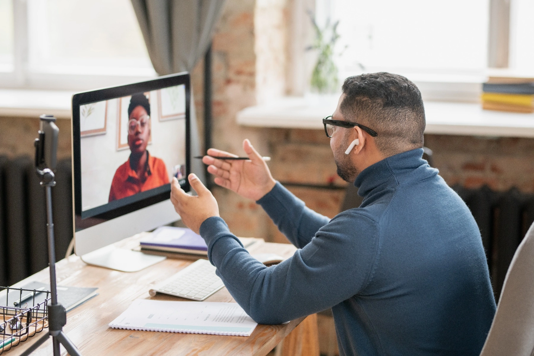Teacher online teaching his student